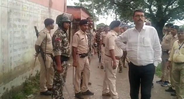 Stone pelting between two groups at the polling station 