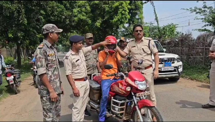 Helmets distributed to two wheeler drivers