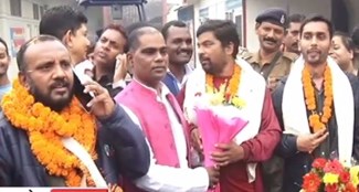 Laborers trapped in tunnel return to Bihar, welcomed by minister and family members at airport