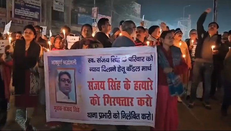 Candle march taken out demanding arrest of murder accused