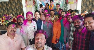 Poets, artists and media persons had fun at the Holi Milan ceremony