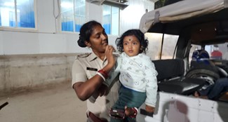 Female police officer is being praised for playing the role of inspector and mother simultaneously.
