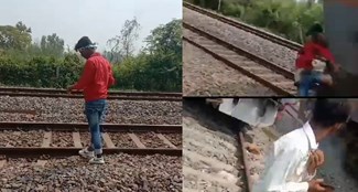 A young man was making a stunt reel on the railway track, when a train came at high speed.