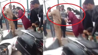 Rain of slaps on inspector  The girl riding the scooter suddenly got angry, know what is the matter
