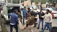 Policemen chased and beat up a police friend who was gheraoing the BJP office