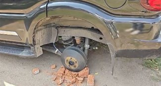 Thieves stole all four tires of a car parked outside the house.