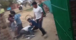 The villagers beat up the contractor doing road construction work from the Municipal Corporation.