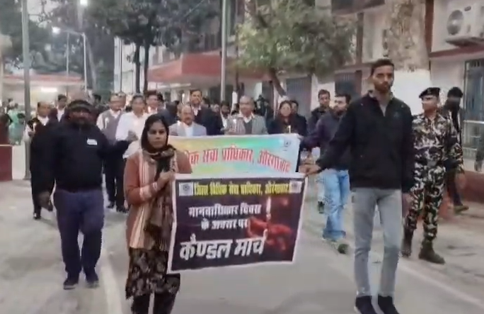 Candle march taken out on International Human Rights Day under the leadership of District Judge