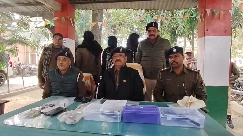 Four arrested with weapons, one on the run.