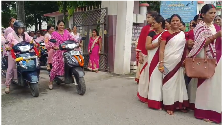 Pink voter awareness rally was organised on scooters to create awareness among women voters for the 2025 Assembly elections.