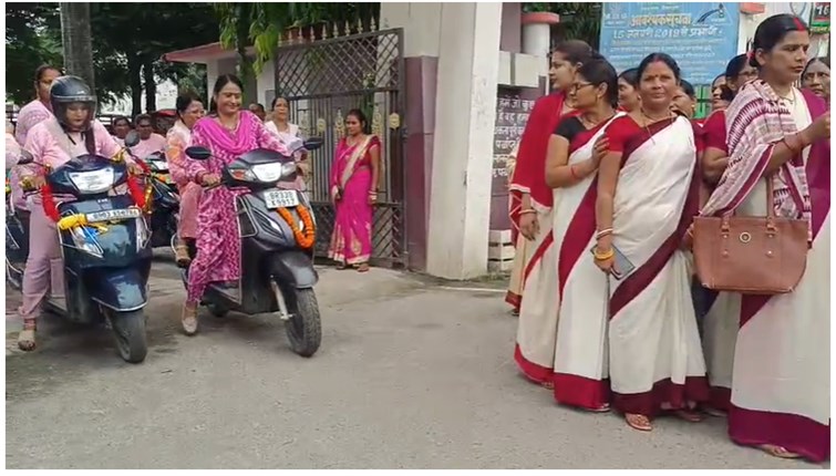 Pink voter awareness rally was organised on scooters to create awareness among women voters for the 2025 Assembly elections.